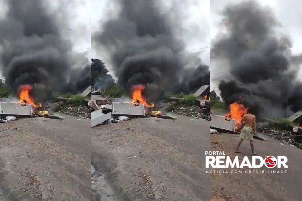 Protesto de moradores termina em incêndio e bloqueio de rua no bairro Tancredo Neves